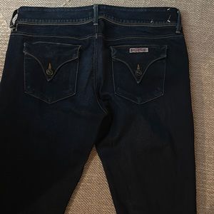 Gently worn, slight tear at belt loop